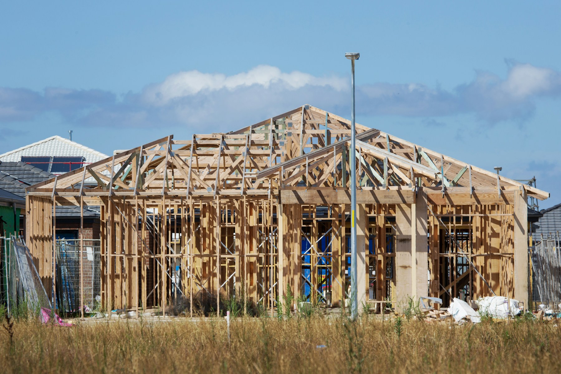 Exposed timber framing of a house under construction